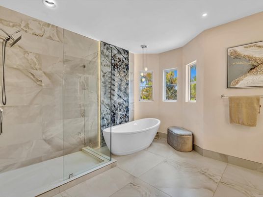 Bathroom, Free Standing Baths, Glass Shower, Interior, Marble, Marble Walls, Pendant Lights, Recessed Lighting
