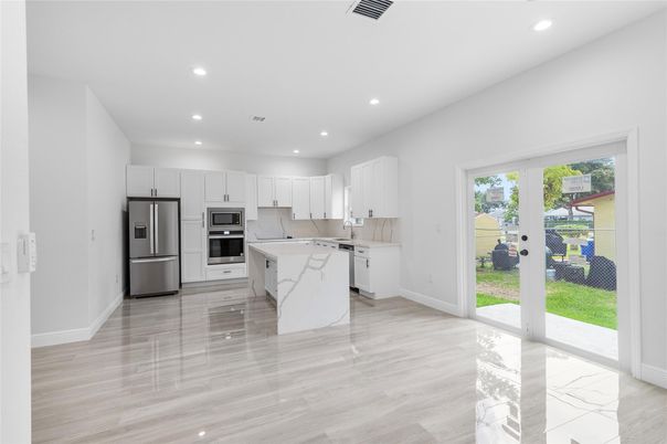 Interior, Kitchen, Recessed Lighting, Stainless Steel Appliances, Wood Texture Flooring