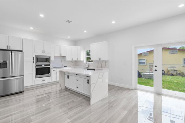 Interior, Kitchen, Recessed Lighting, Stainless Steel Appliances, Wood Texture Flooring
