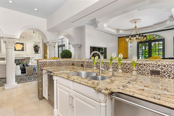 Chandelier, Fireplace, Interior, Kitchen, Recessed Lighting, Stainless Steel Appliances