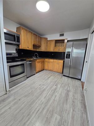Interior, Kitchen, Stainless Steel Appliances, Wood Texture Flooring