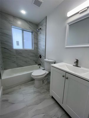 Bathroom, Dual Sink Vanities, Interior, Marble, Marble Walls, Recessed Lighting