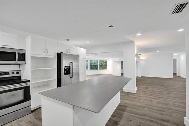 Interior, Kitchen, Recessed Lighting, Stainless Steel Appliances, Wood Texture Flooring