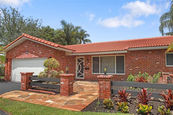 Attached, Exterior, Facade, Brick Facade, Spanish Mediterranean