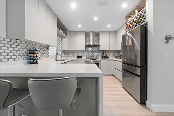 Interior, Kitchen, Recessed Lighting, Stainless Steel Appliances, Wood Texture Flooring