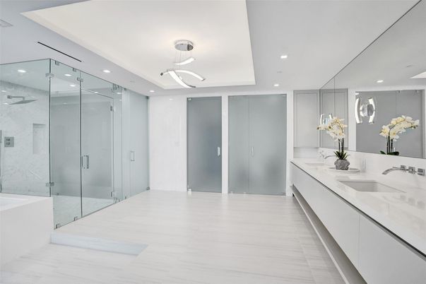 Bathroom, Dual Sink Vanities, Glass Shower, Interior, Marble Walls, Recessed Lighting
