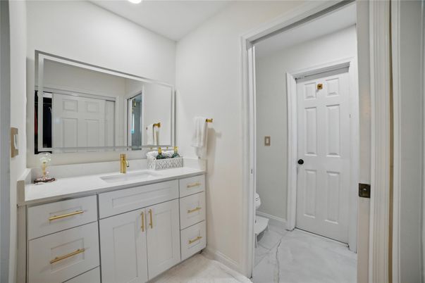Bathroom, Dual Sink Vanities, Interior, Marble, Recessed Lighting