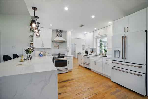 Interior, Kitchen, Pendant Lights, Recessed Lighting, Stainless Steel Appliances, Wood Texture Flooring