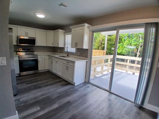 Interior, Kitchen, Recessed Lighting, Stainless Steel Appliances, Wood Texture Flooring