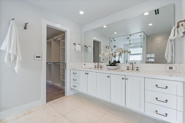 Bathroom, Dual Sink Vanities, Glass Shower, Interior, Recessed Lighting, Walk-in Closets, Wood Texture Flooring