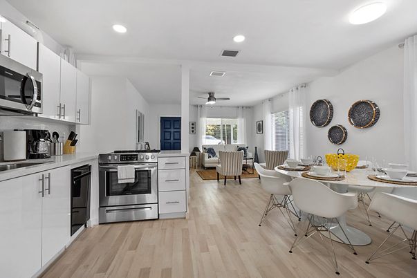 Dining room, Interior, Kitchen, Living room, Recessed Lighting, Stainless Steel Appliances, Wood Texture Flooring