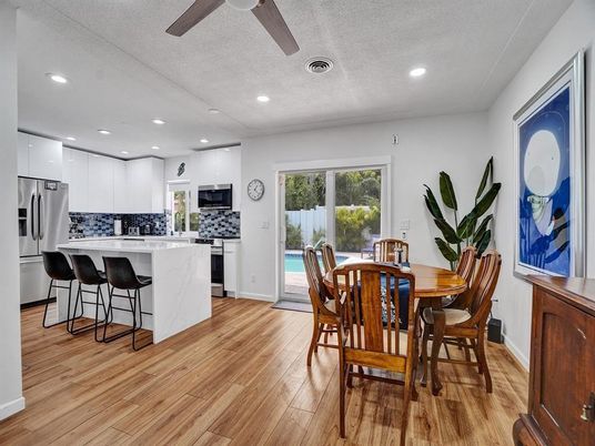 Dining room, Interior, Kitchen, Recessed Lighting, Stainless Steel Appliances, Wood Texture Flooring