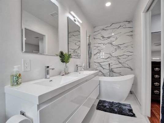 Bathroom, Dual Sink Vanities, Free Standing Baths, Interior, Marble Walls, Recessed Lighting