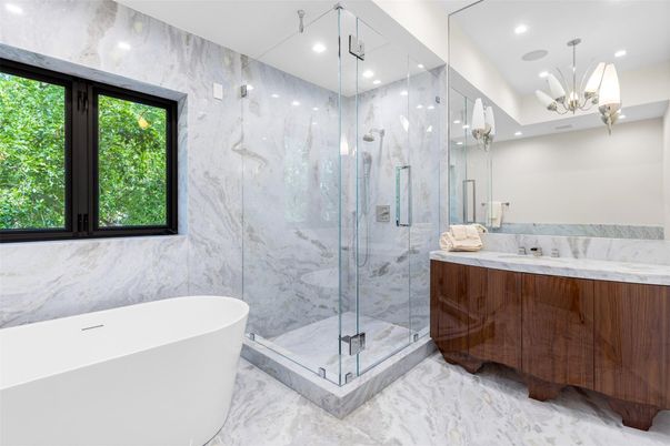 Bathroom, Chandelier, Free Standing Baths, Glass Shower, Interior, Marble, Marble Walls, Recessed Lighting