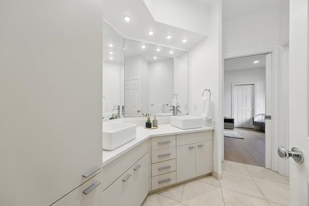Bathroom, Dual Sink Vanities, Interior, Recessed Lighting, Wood Texture Flooring
