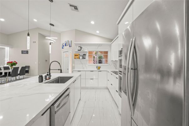 Dining room, Interior, Kitchen, Marble, Pendant Lights, Recessed Lighting, Stainless Steel Appliances