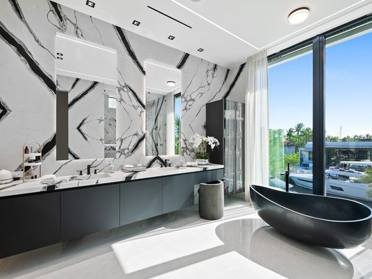 Bathroom, Dual Sink Vanities, Free Standing Baths, Interior, Marble Walls, Recessed Lighting, Water