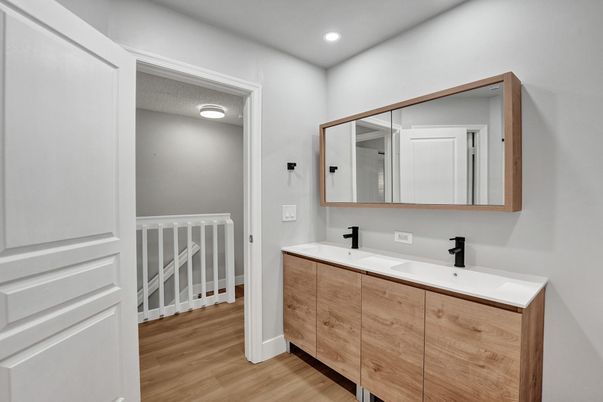 Bathroom, Dual Sink Vanities, Interior, Recessed Lighting, Wood Texture Flooring