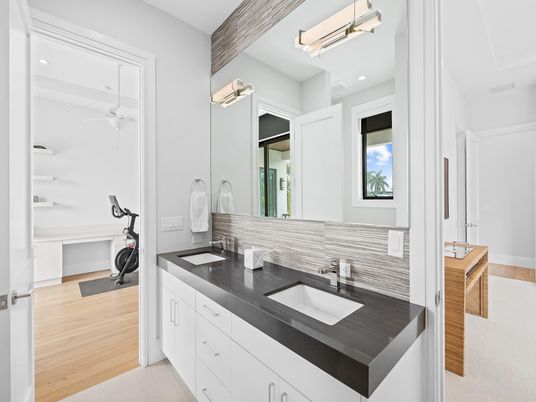 Bathroom, Dual Sink Vanities, Fitness Equipment, Interior, Recessed Lighting, Wood Texture Flooring
