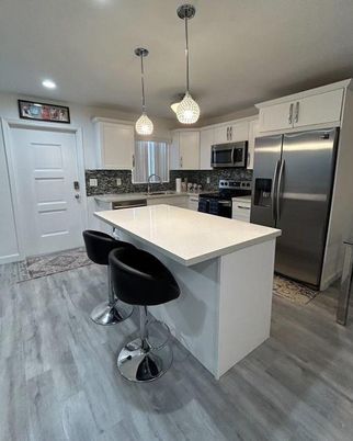 Interior, Kitchen, Pendant Lights, Recessed Lighting, Stainless Steel Appliances, Wood Texture Flooring