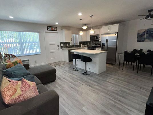 Dining room, Interior, Kitchen, Living room, Pendant Lights, Recessed Lighting, Stainless Steel Appliances, Wood Texture Flooring