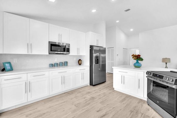 Interior, Kitchen, Recessed Lighting, Stainless Steel Appliances, Wood Texture Flooring