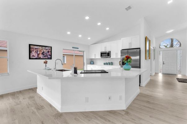 Interior, Kitchen, Recessed Lighting, Stainless Steel Appliances, Wood Texture Flooring