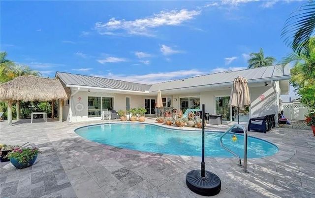 Exterior, Pool, Solar Panels