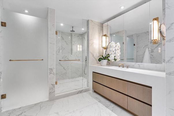 Bathroom, Dual Sink Vanities, Glass Shower, Interior, Marble, Marble Walls, Recessed Lighting