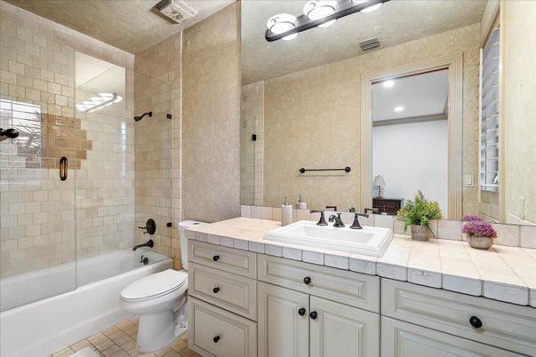 Bathroom, Glass Shower, Interior, Recessed Lighting, Tile Countertops