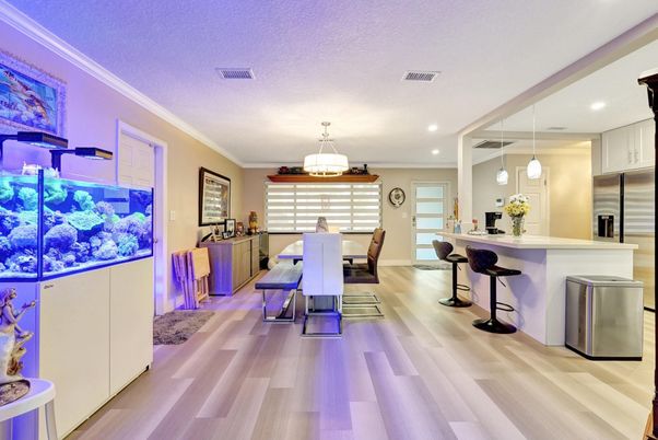 Dining room, Interior, Kitchen, Pendant Lights, Recessed Lighting, Stainless Steel Appliances, Wood Texture Flooring