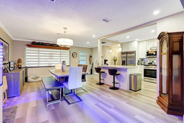 Dining room, Interior, Kitchen, Pendant Lights, Recessed Lighting, Stainless Steel Appliances, Wood Texture Flooring