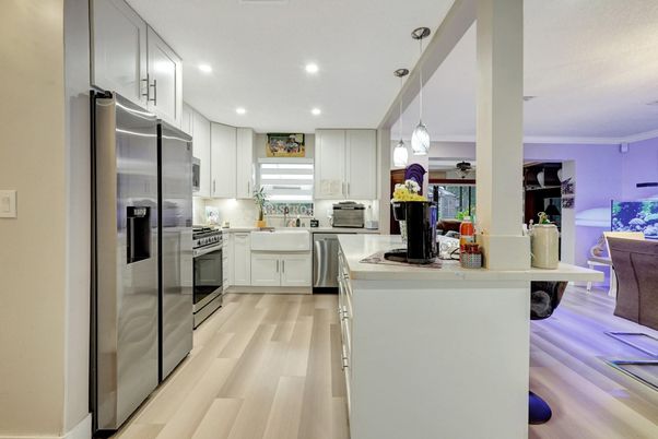 Interior, Kitchen, Pendant Lights, Recessed Lighting, Stainless Steel Appliances, Wood Texture Flooring