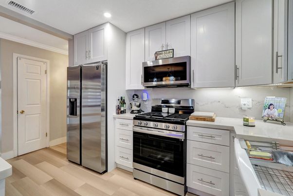 Interior, Kitchen, Recessed Lighting, Stainless Steel Appliances, Wood Texture Flooring