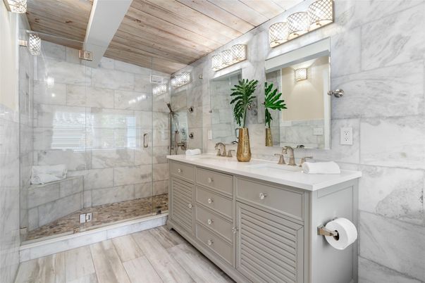 Bathroom, Dual Sink Vanities, Glass Shower, Interior, Marble Walls, Wooden Ceilings, Wood Texture Flooring