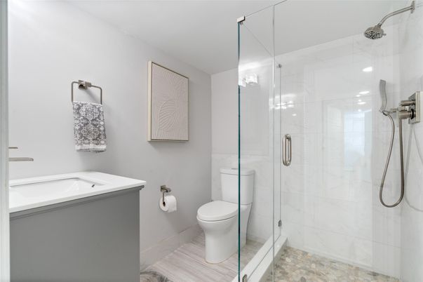 Bathroom, Glass Shower, Interior, Marble Walls, Wood Texture Flooring