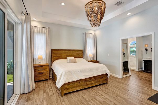 Bedroom, Chandelier, Interior, Pendant Lights, Recessed Lighting, Wood Texture Flooring
