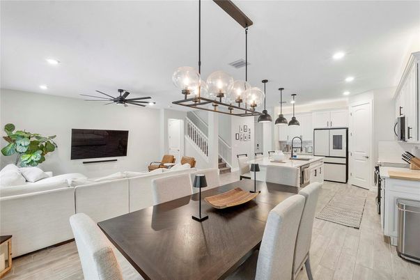 Dining room, Interior, Kitchen, Living room, Pendant Lights, Recessed Lighting, Stainless Steel Appliances, Wood Texture Flooring