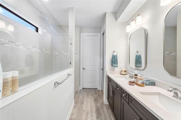 Bathroom, Dual Sink Vanities, Glass Shower, Interior, Wood Texture Flooring
