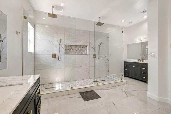 Bathroom, Dual Sink Vanities, Glass Shower, Interior, Marble, Marble Walls, Recessed Lighting