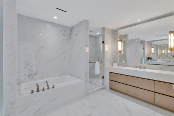 Bathroom, Dual Sink Vanities, Glass Shower, Interior, Marble, Marble Walls, Recessed Lighting