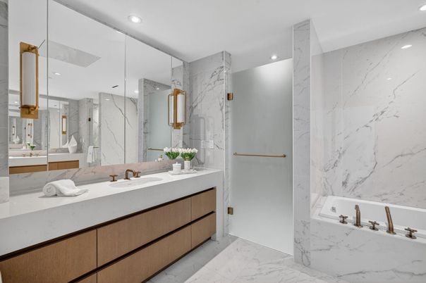 Bathroom, Dual Sink Vanities, Glass Shower, Interior, Marble, Marble Walls, Recessed Lighting