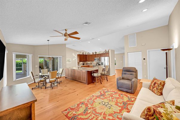 Dining room, Interior, Kitchen, Living room, Pendant Lights, Recessed Lighting, Stainless Steel Appliances, Wood Texture Flooring