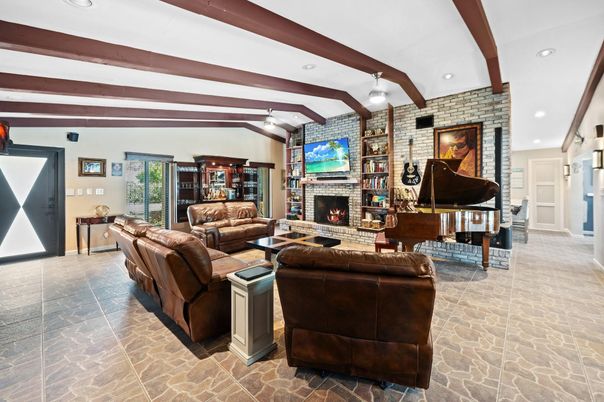 Fireplace, Interior, Living room, Piano, Recessed Lighting, Stone Walls, Wooden Beams