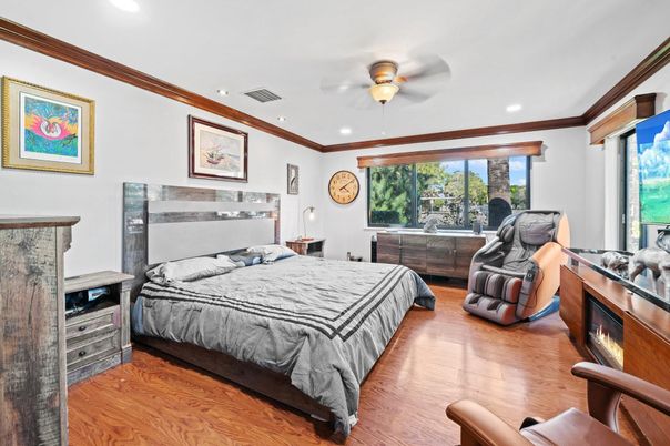 Bedroom, Fireplace, Interior, Recessed Lighting, Wood Texture Flooring