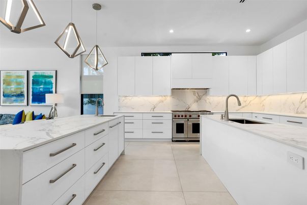 Interior, Kitchen, Marble Walls, Pendant Lights, Recessed Lighting, Stainless Steel Appliances