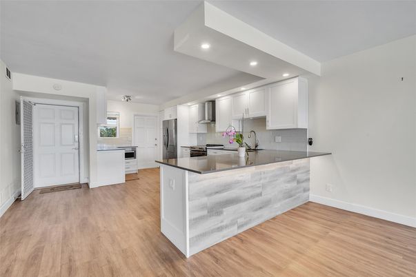Interior, Kitchen, Recessed Lighting, Stainless Steel Appliances, Wood Texture Flooring