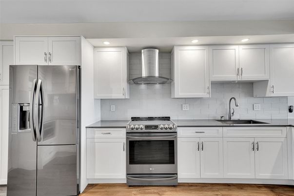 Interior, Kitchen, Recessed Lighting, Stainless Steel Appliances, Wood Texture Flooring