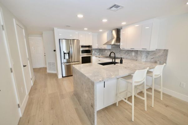 Interior, Kitchen, Recessed Lighting, Stainless Steel Appliances, Wood Texture Flooring