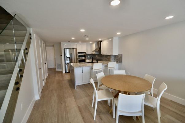 Dining room, Interior, Kitchen, Recessed Lighting, Stainless Steel Appliances, Wood Texture Flooring